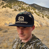 QuikCamo 7 Panel Trucker Hat (Snapback OSFM)